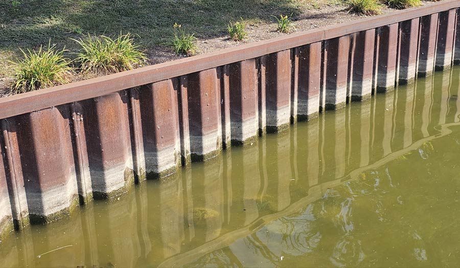 A seawall on the shore of a lake